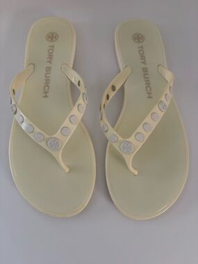 Tory Burch Ivory/pale yellow thong jelly  sandals size 7. Studded w/metal logos